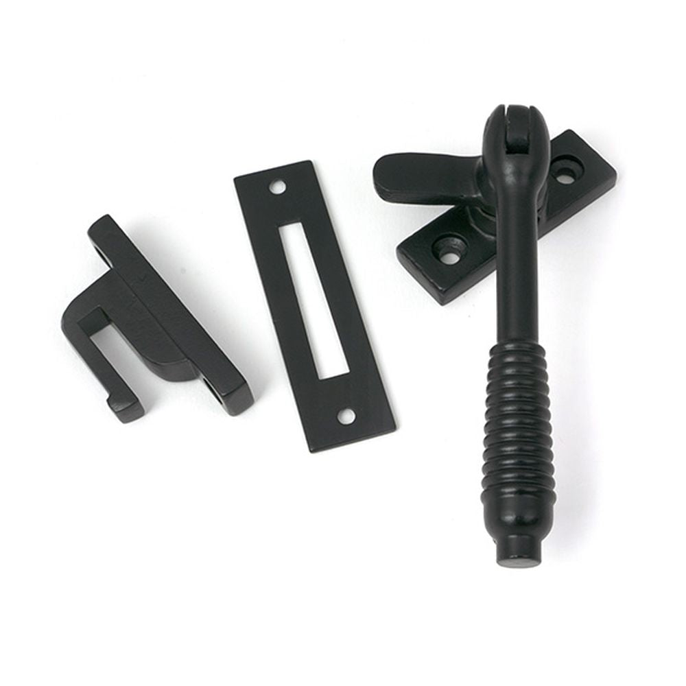 High quality images of the From The Anvil - Matt Black Locking Reeded Fastener | Sku. Anvil-52529 | available to order from Trade Door Handles, quick delivery at discounted prices.