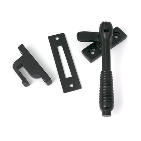 High quality images of the From The Anvil - Matt Black Locking Reeded Fastener | Sku. Anvil-52529 | available to order from Trade Door Handles, quick delivery at discounted prices.