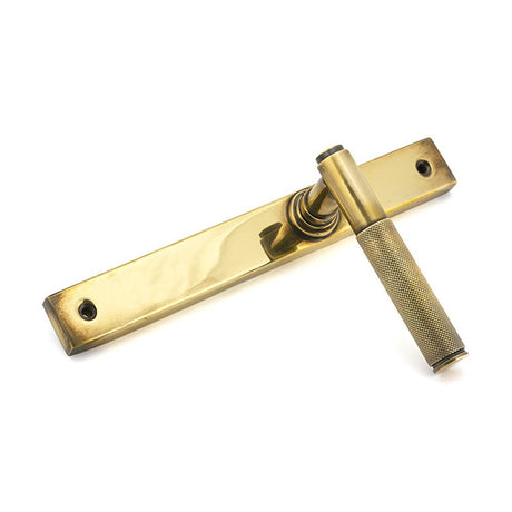 High quality images of the From The Anvil - Aged Brass Brompton Slimline Lever Espag. Latch Set | Sku. Anvil-52536 | available to order from Trade Door Handles, quick delivery at discounted prices.