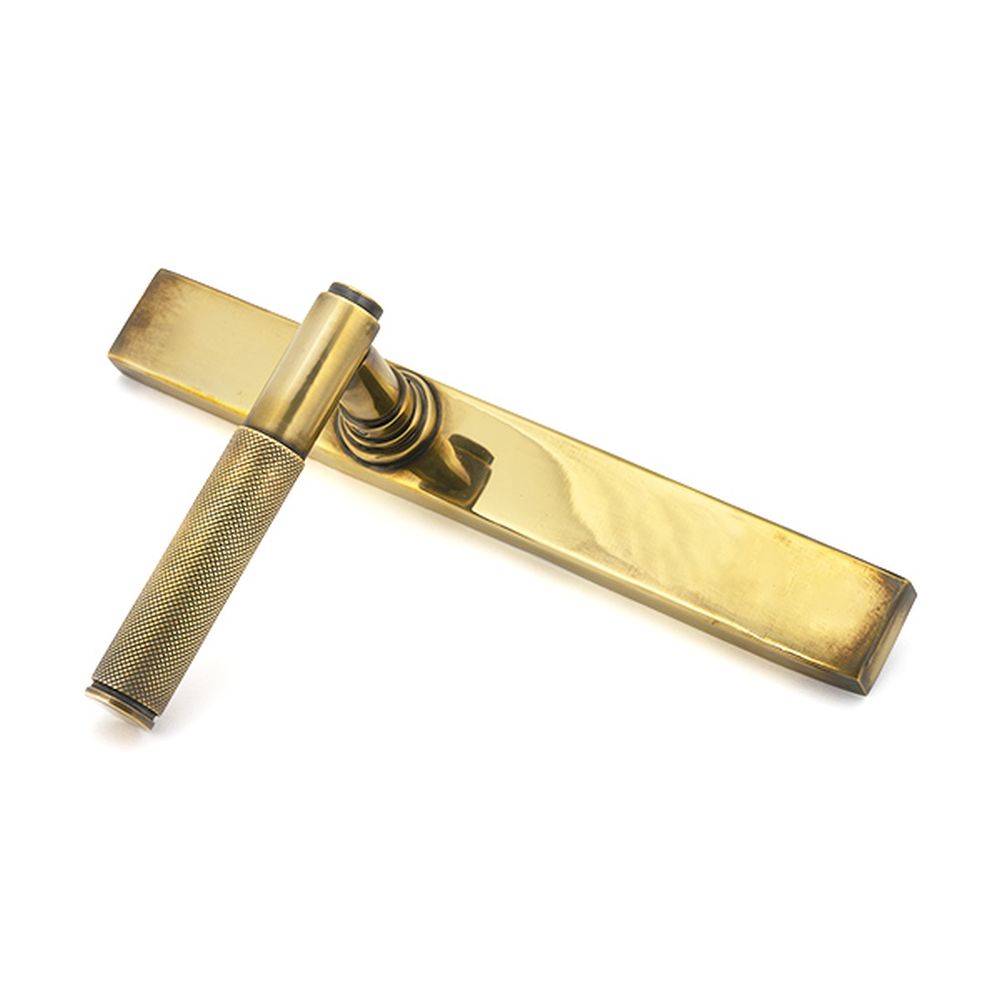 High quality images of the From The Anvil - Aged Brass Brompton Slimline Lever Espag. Latch Set | Sku. Anvil-52536 | available to order from Trade Door Handles, quick delivery at discounted prices.