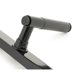High quality images of the From The Anvil - Black Brompton Slimline Lever Espag. Latch Set | Sku. Anvil-52539 | available to order from Trade Door Handles, quick delivery at discounted prices.