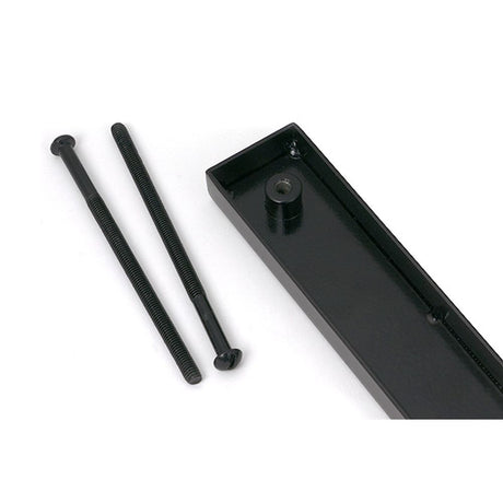 High quality images of the From The Anvil - Black Slimline External Blank Plate (Each) | Sku. Anvil-52568 | available to order from Trade Door Handles, quick delivery at discounted prices.