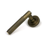 High quality images of the From The Anvil - Burnished Brass Brompton Lever on Rose Set (Plain) - Unsprung | Sku. Anvil-52636 | available to order from Trade Door Handles, quick delivery at discounted prices.