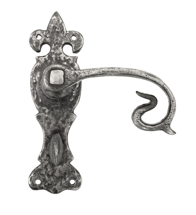From The Anvil - Natural Textured Curly Lever Bathroom Set | Sku. 83502 | Trade Door Handles.
