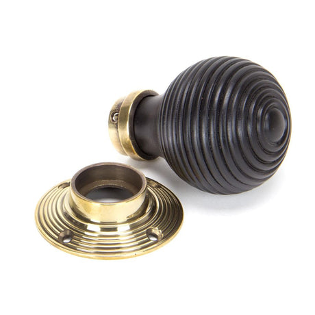 From The Anvil - Ebony & Aged Brass Beehive Mortice/Rim Knob Set | Sku. 83574 | Trade Door Handles.