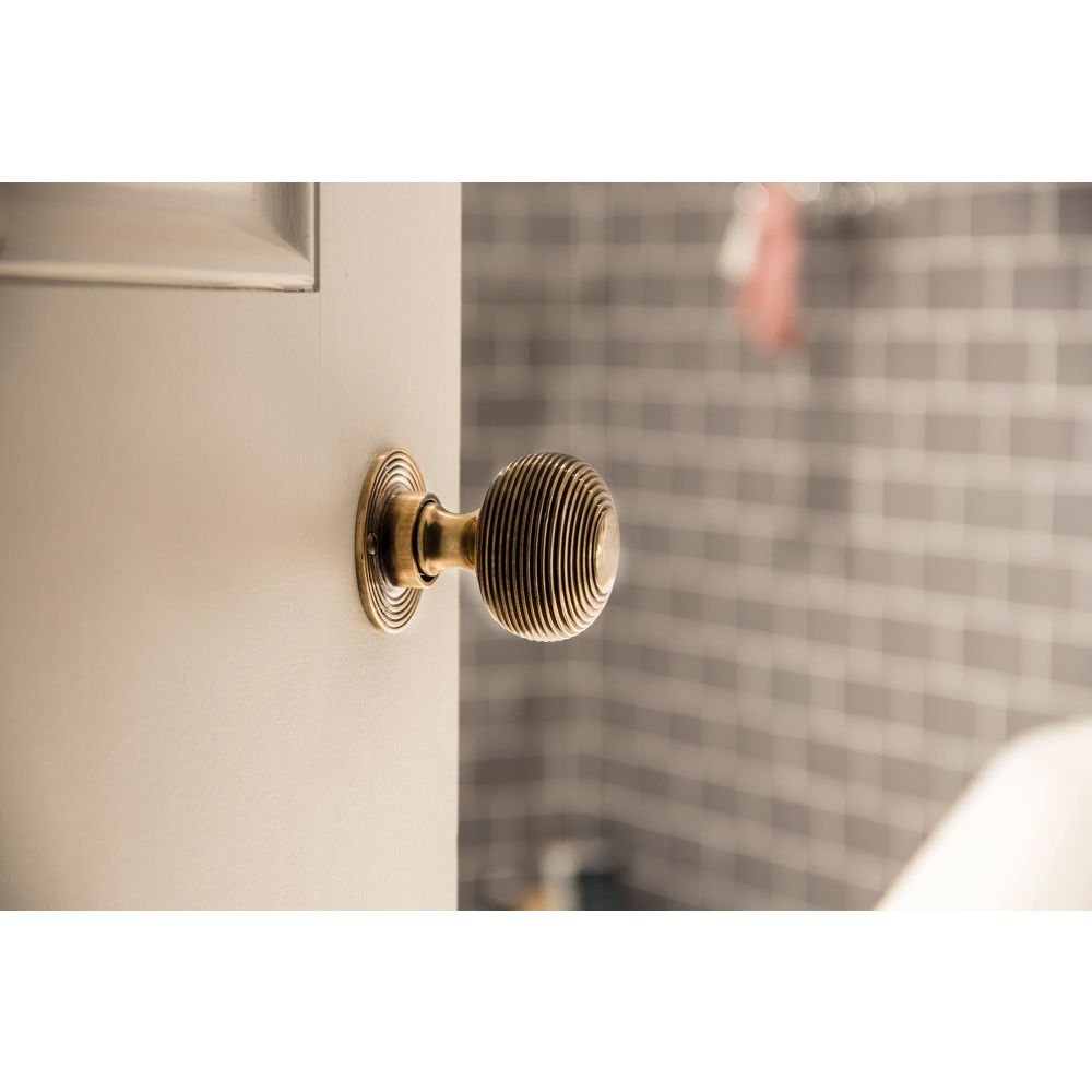 From The Anvil - Aged Brass Beehive Mortice/Rim Knob Set | Sku. 83633 | Trade Door Handles.