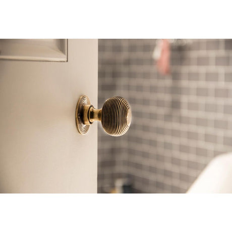 From The Anvil - Aged Brass Beehive Mortice/Rim Knob Set | Sku. 83633 | Trade Door Handles.