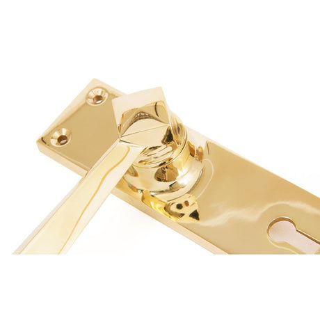 From The Anvil - Polished Brass Straight Lever Lock Set | Sku. 83829 | Trade Door Handles.