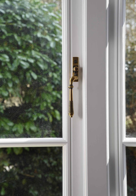 From The Anvil - Aged Brass Reeded Espag - LH | Sku. 83913 | Trade Door Handles.