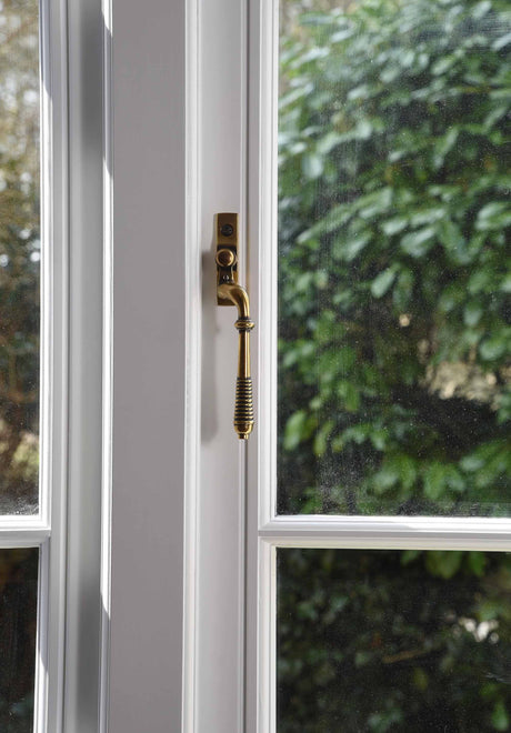 From The Anvil - Aged Brass Reeded Espag - RH | Sku. 83915 | Trade Door Handles.