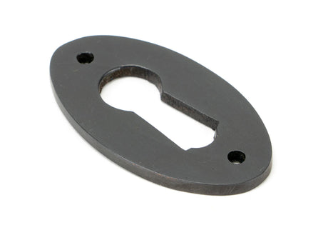 From The Anvil - Aged Bronze Oval Escutcheon | Sku. 83948 | Trade Door Handles.