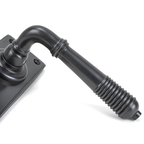From The Anvil - Aged Bronze Reeded Lever Latch Set | Sku. 83954 | Trade Door Handles.