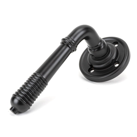 From The Anvil - Aged Bronze Reeded Lever on Rose Set | Sku. 83957 | Trade Door Handles.