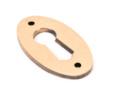 From The Anvil - Polished Bronze Oval Escutcheon | Sku. 91927 | Trade Door Handles.