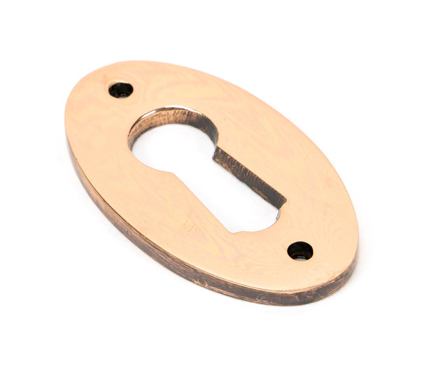 From The Anvil - Polished Bronze Oval Escutcheon | Sku. 91927 | Trade Door Handles.