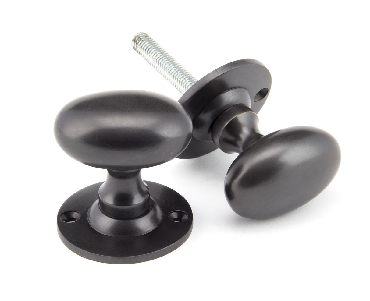 From The Anvil - Aged Bronze Oval Mortice/Rim Knob Set | Sku. 91976 | Trade Door Handles.