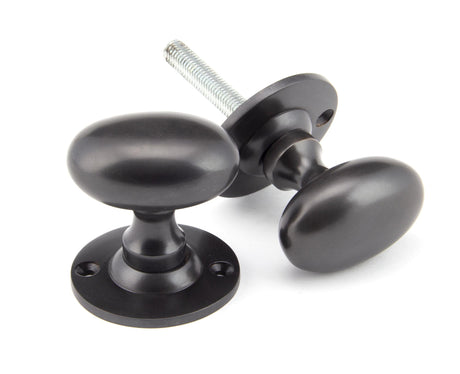 From The Anvil - Aged Bronze Oval Mortice/Rim Knob Set | Sku. 91976 | Trade Door Handles.