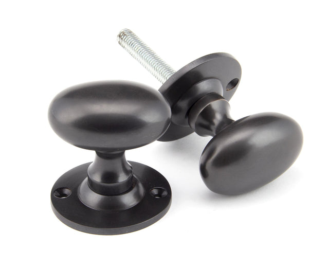 From The Anvil - Aged Bronze Oval Mortice/Rim Knob Set | Sku. 91976 | Trade Door Handles.