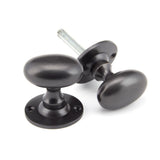 From The Anvil - Aged Bronze Oval Mortice/Rim Knob Set | Sku. 91976 | Trade Door Handles.