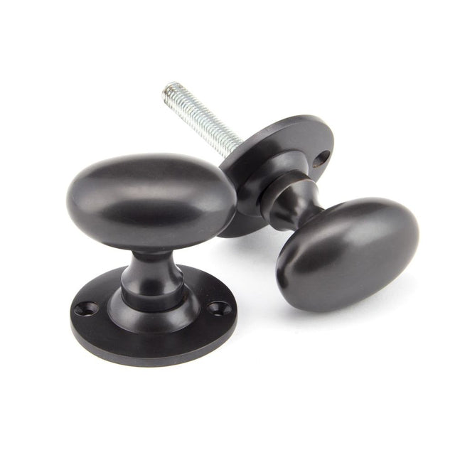 From The Anvil - Aged Bronze Oval Mortice/Rim Knob Set | Sku. 91976 | Trade Door Handles.