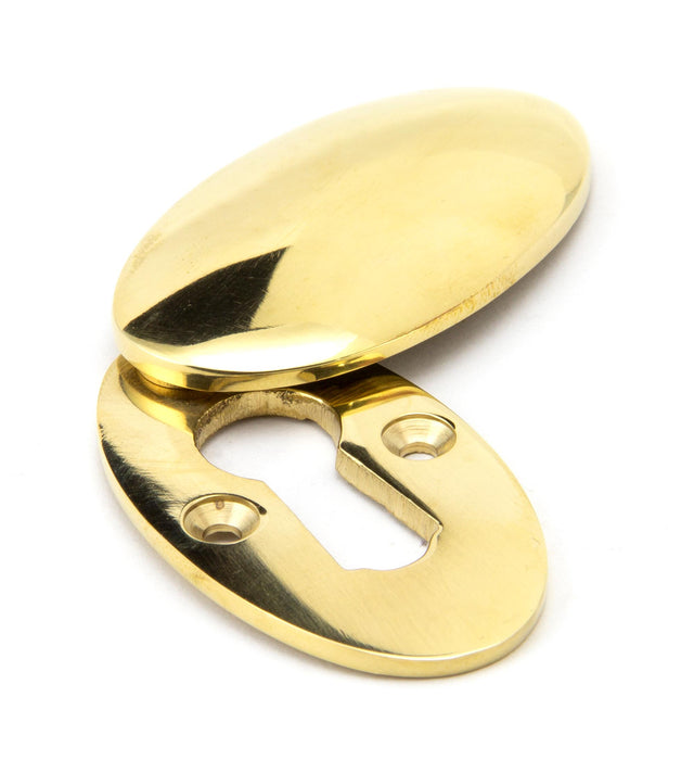 From The Anvil - Polished Brass Oval Escutcheon & Cover | Sku. 91987 | Trade Door Handles.