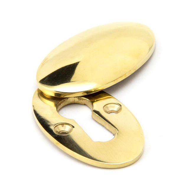 From The Anvil - Polished Brass Oval Escutcheon & Cover | Sku. 91987 | Trade Door Handles.