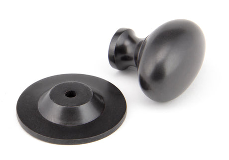 From The Anvil - Aged Bronze Oval Cabinet Knob 40mm | Sku. 92035 | Trade Door Handles.