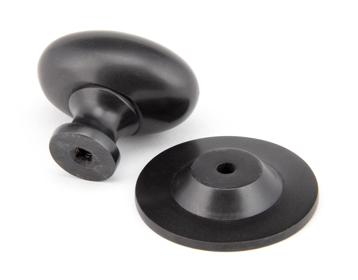 From The Anvil - Aged Bronze Oval Cabinet Knob 40mm | Sku. 92035 | Trade Door Handles.