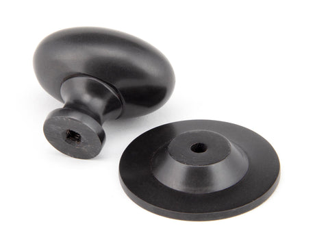 From The Anvil - Aged Bronze Oval Cabinet Knob 40mm | Sku. 92035 | Trade Door Handles.