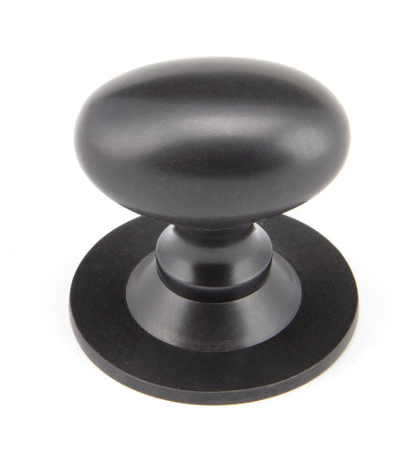 From The Anvil - Aged Bronze Oval Cabinet Knob 40mm | Sku. 92035 | Trade Door Handles.