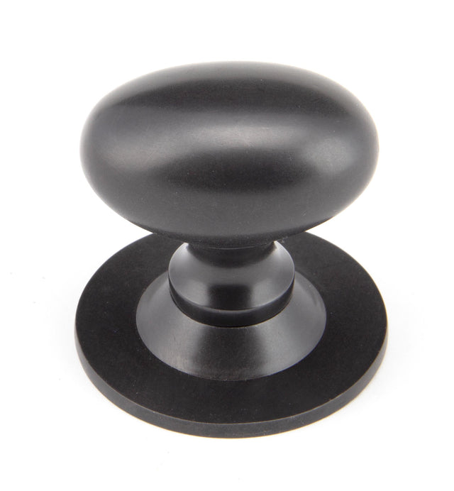 From The Anvil - Aged Bronze Oval Cabinet Knob 40mm | Sku. 92035 | Trade Door Handles.