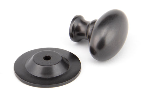 From The Anvil - Aged Bronze Oval Cabinet Knob 33mm | Sku. 92036 | Trade Door Handles.