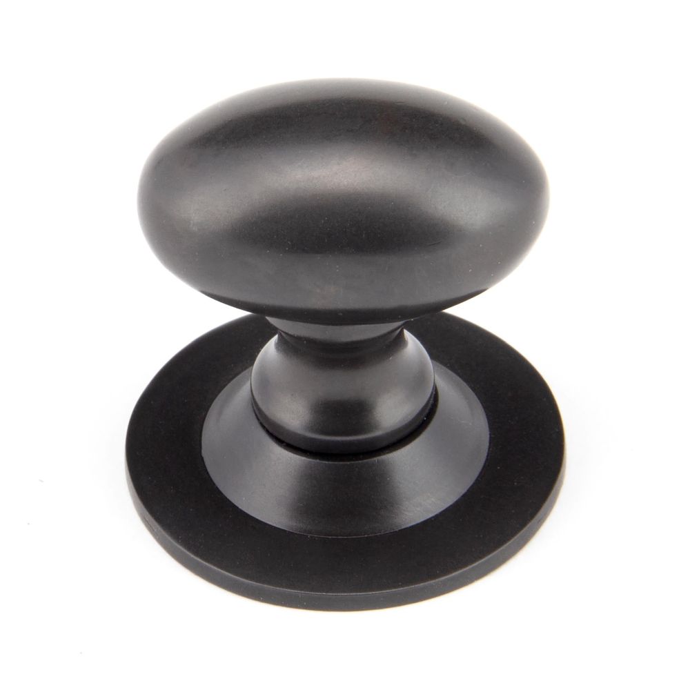 From The Anvil - Aged Bronze Oval Cabinet Knob 33mm | Sku. 92036 | Trade Door Handles.