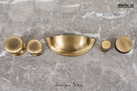 Quality image of Old English Winchester Solid Brass Cabinet Cup Pull on Concealed Fix - Antique Brass | Sku. oec1176ab | available from Trade Door Handles.