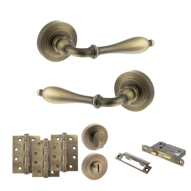 Quality image of Old English Wrexham Door Handle Pack (Bathroom Set - 2.5" CE Bathroom Lock, 4" Fire Rated Hinges x3) - Matt Antique Brass | Sku. adpoe142mab10 | available from Trade Door Handles.