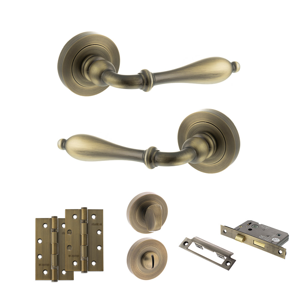 Quality image of Old English Wrexham Door Handle Pack (Bathroom Set - 3" CE Bathroom Lock, 4" Slim Knuckle Hinges x2) - Matt Antique Brass | Sku. adpoe142mab13 | available from Trade Door Handles.