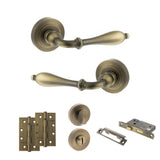 Quality image of Old English Wrexham Door Handle Pack (Bathroom Set - 3" CE Bathroom Lock, 4" Slim Knuckle Hinges x2) - Matt Antique Brass | Sku. adpoe142mab13 | available from Trade Door Handles.