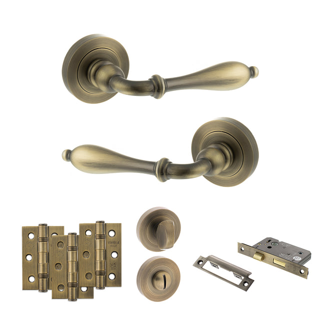 Quality image of Old English Wrexham Door Handle Pack (Bathroom Set - 3" CE Bathroom Lock, 3" Fire Rated Hinges x3) - Matt Antique Brass | Sku. adpoe142mab9 | available from Trade Door Handles.
