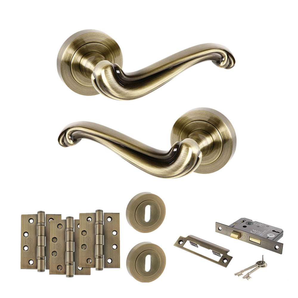 Quality image of Old English Colchester Door Handle Pack (3 Lever Lock Set - 2.5" CE Sashlock, 4" Fire Rated Hinges x3) - Antique Brass | Sku. adpoe177ab16 | available from Trade Door Handles.