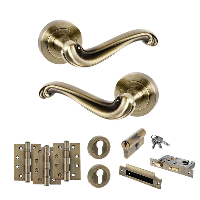 Quality image of Old English Colchester Door Handle Pack (Euro Lock Set - 3" CE Sashlock, 4" Fire Rated Hinges x3) - Antique Brass | Sku. adpoe177ab23 | available from Trade Door Handles.