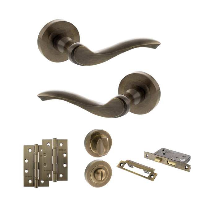 Quality image of Old English Warwick Door Handle Pack (Bathroom Set - 3" CE Bathroom Lock, 4" Slim Knuckle Hinges x2) - Antique Brass | Sku. adpoe178ab13 | available from Trade Door Handles.