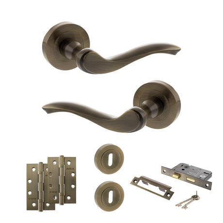 Quality image of Old English Warwick Door Handle Pack (3 Lever Lock Set - 2.5" CE Sashlock, 4" Slim Knuckle Hinges x2) - Antique Brass | Sku. adpoe178ab18 | available from Trade Door Handles.