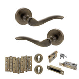 Quality image of Old English Warwick Door Handle Pack (Euro Lock Set - 2.5" CE Sashlock, 4" Fire Rated Hinges x3) - Antique Brass | Sku. adpoe178ab22 | available from Trade Door Handles.