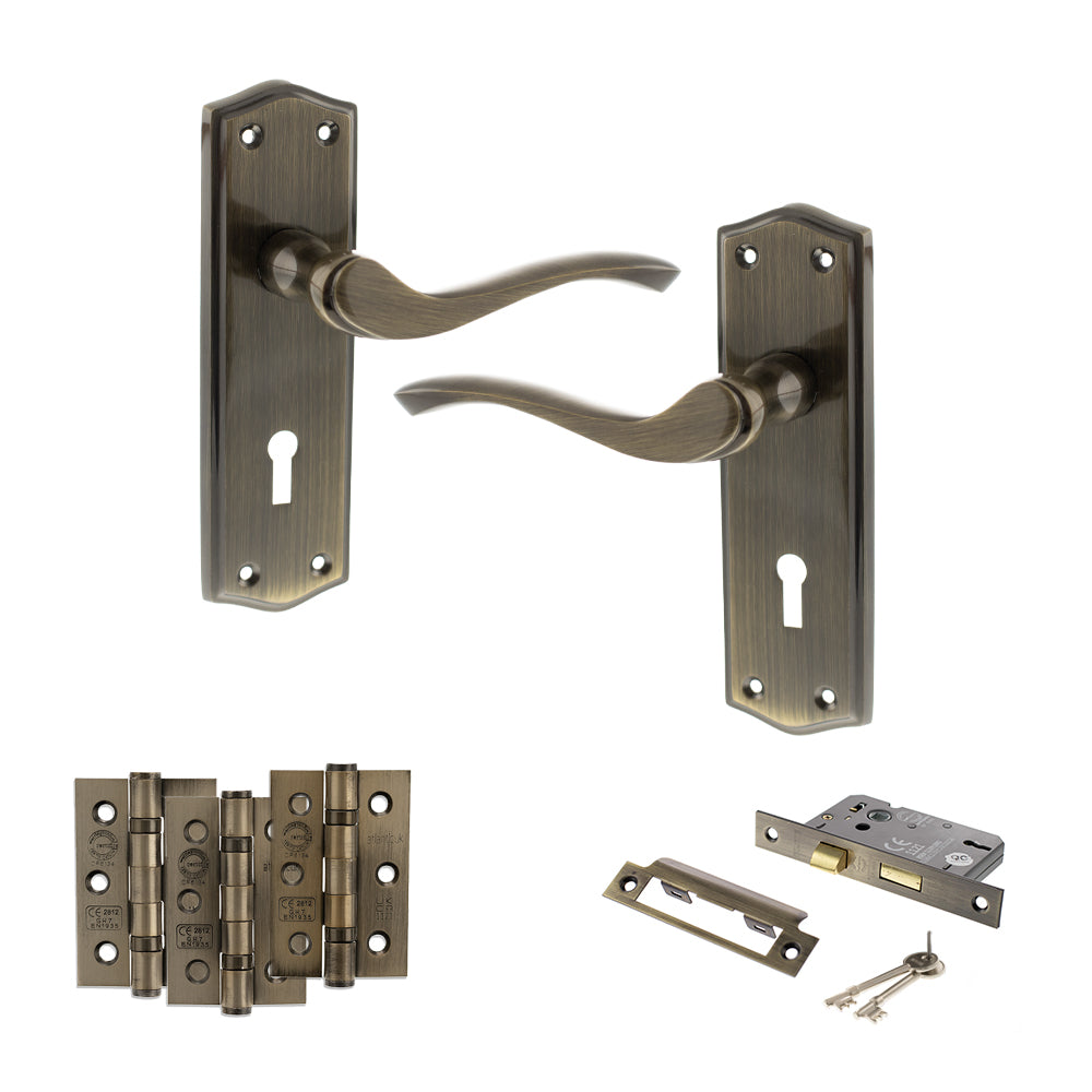 Quality image of Old English Warwick Door Handle Pack (3 Lever Lock Set - 2.5" CE Sashlock, 3" Fire Rated Hinges x3) - Antique Brass | Sku. adpoe178kab14 | available from Trade Door Handles.