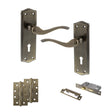 Quality image of Old English Warwick Door Handle Pack (3 Lever Lock Set - 2.5" CE Sashlock, 4" Slim Knuckle Hinges x2) - Antique Brass | Sku. adpoe178kab18 | available from Trade Door Handles.