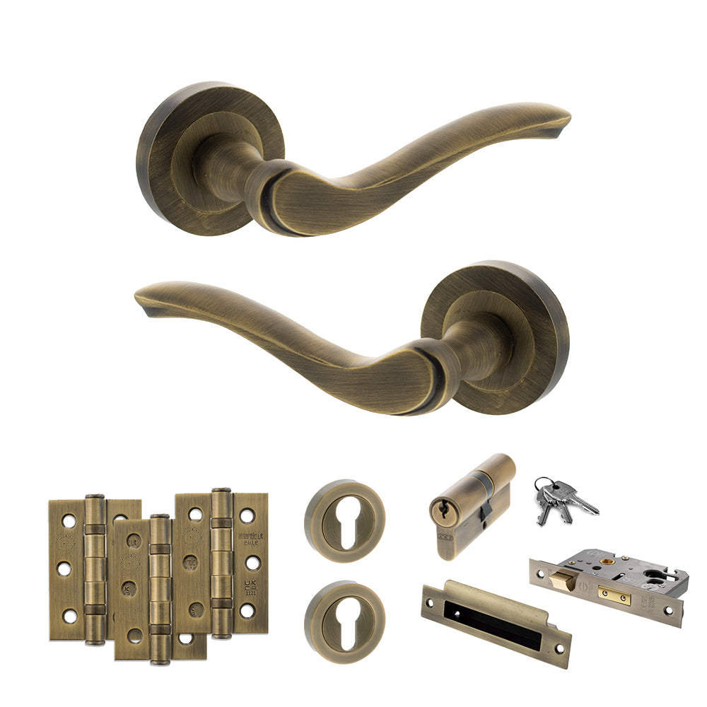 Quality image of Old English Warwick Door Handle Pack (Euro Lock Set - 2.5" CE Sashlock, 3" Fire Rated Hinges x3) - Matt Antique Brass | Sku. adpoe178mab20 | available from Trade Door Handles.