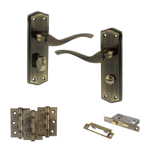 Quality image of Old English Warwick Door Handle Pack (Bathroom Set - 2.5" CE Bathroom Lock, 3" Fire Rated Hinges x3) - Antique Brass | Sku. adpoe178wcab8 | available from Trade Door Handles.