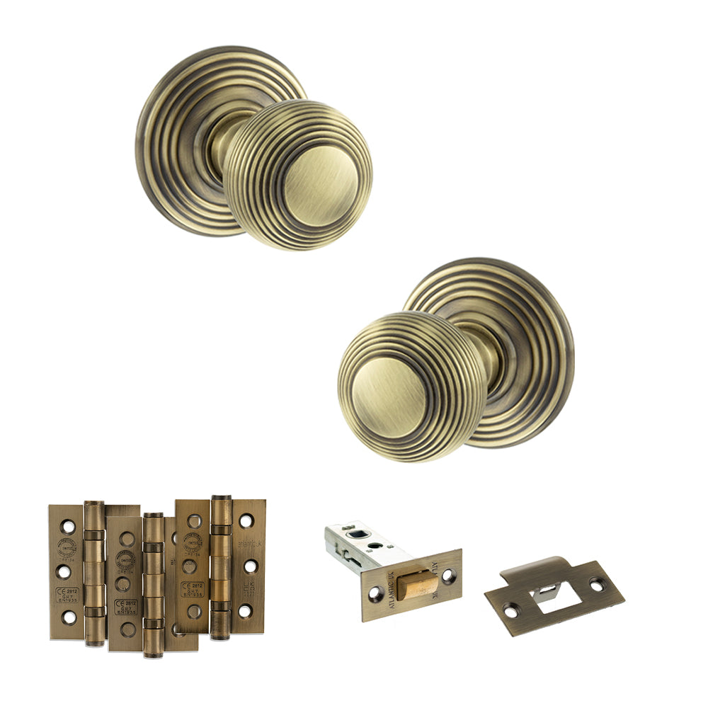 Quality image of Old English Ripon Door Knob Pack (Latch Set - 4" HD Latch, 3" Fire Rated Hinges x3) - Antique Brass | Sku. adpoe50rmkab55 | available from Trade Door Handles.