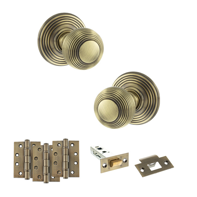 Quality image of Old English Ripon Door Knob Pack (Latch Set - 3" HD Latch, 4" Fire Rated Hinges x3) - Antique Brass | Sku. adpoe50rmkab56 | available from Trade Door Handles.
