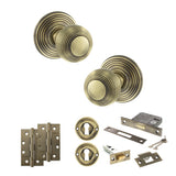 Quality image of Old English Ripon Door Knob Pack (Lock Set - 3" Latch & Deadlock, 4" Slim Knuckle Hinges x2) - Antique Brass | Sku. adpoe50rmkab68 | available from Trade Door Handles.